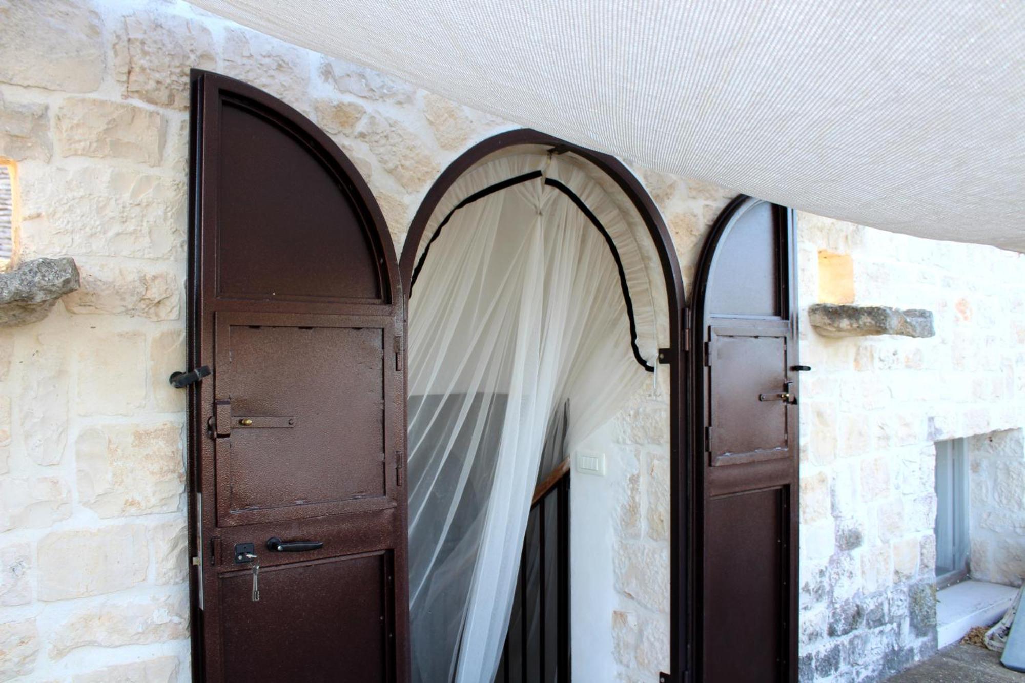 Trulli E Masseria Ianella โลโกโรตอนโด ภายนอก รูปภาพ