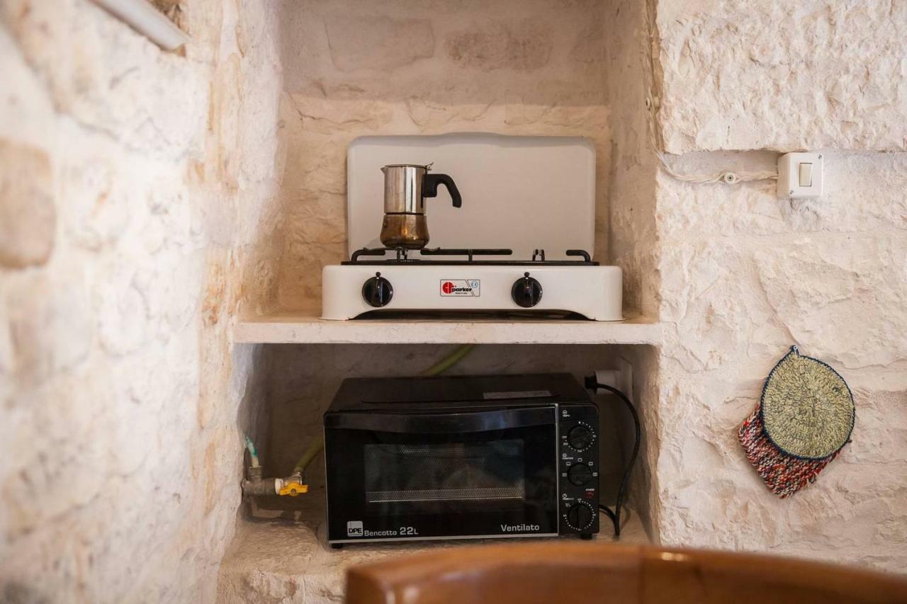 Trulli E Masseria Ianella โลโกโรตอนโด ภายนอก รูปภาพ